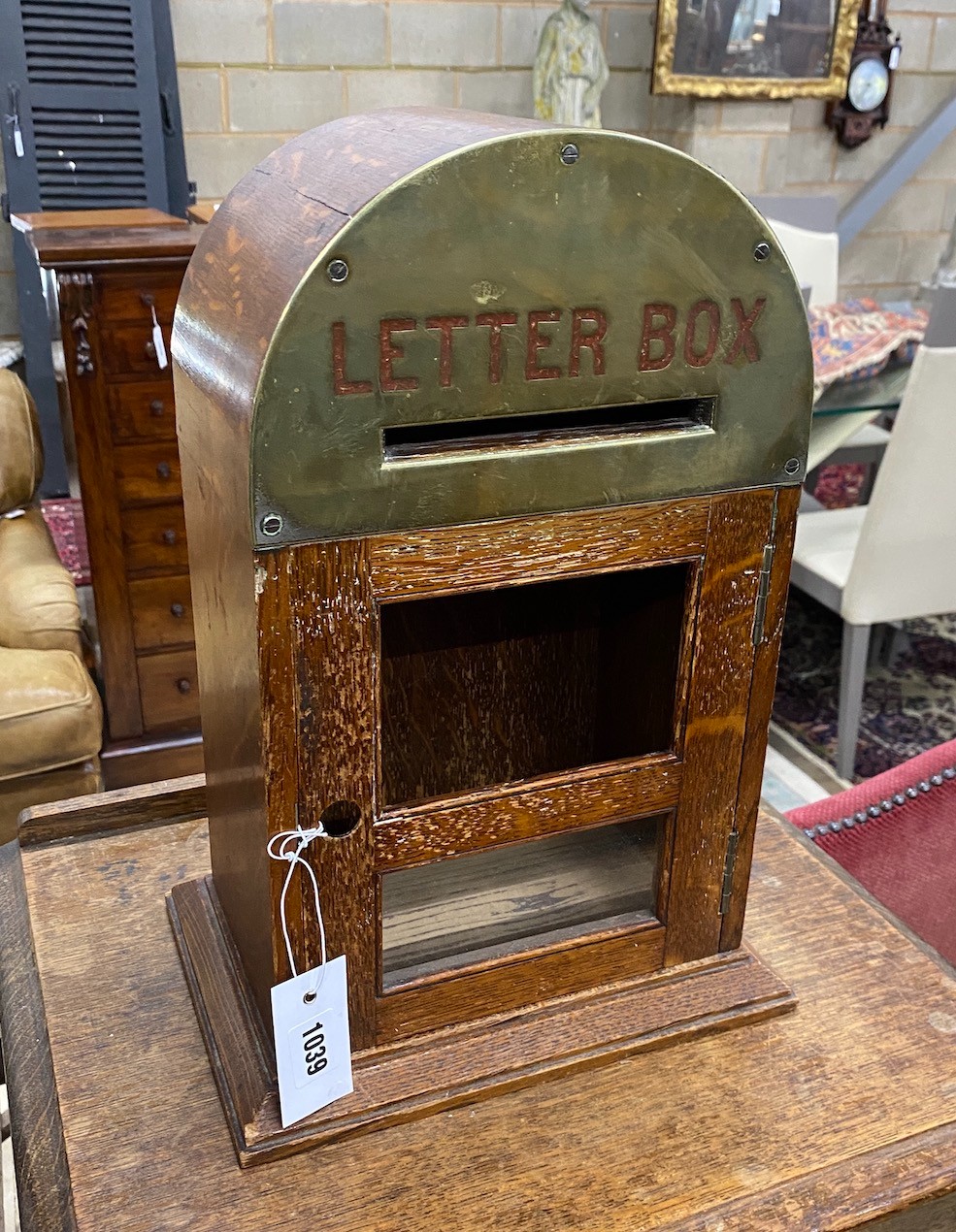 An early 20th century brass mounted oak internal letterbox, width 28cm, depth 20cm, height 41cm